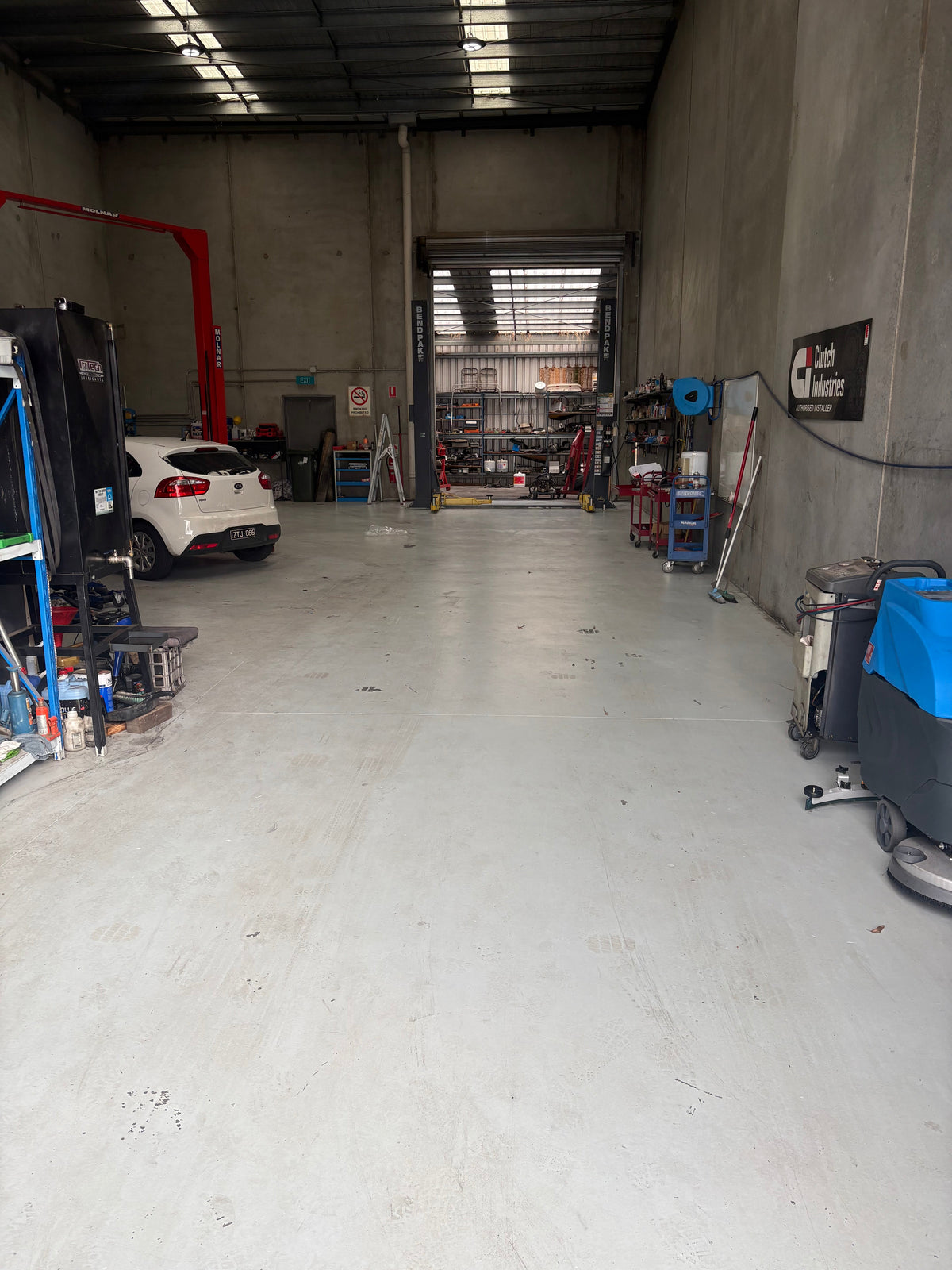 Commercial van receiving scheduled maintenance at Progressive Vans Melbourne workshop