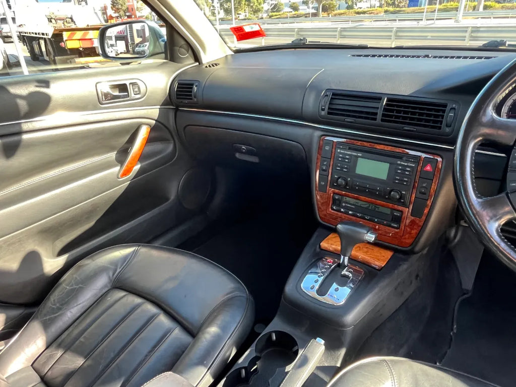 Car interior with dashboard and steering wheel visible