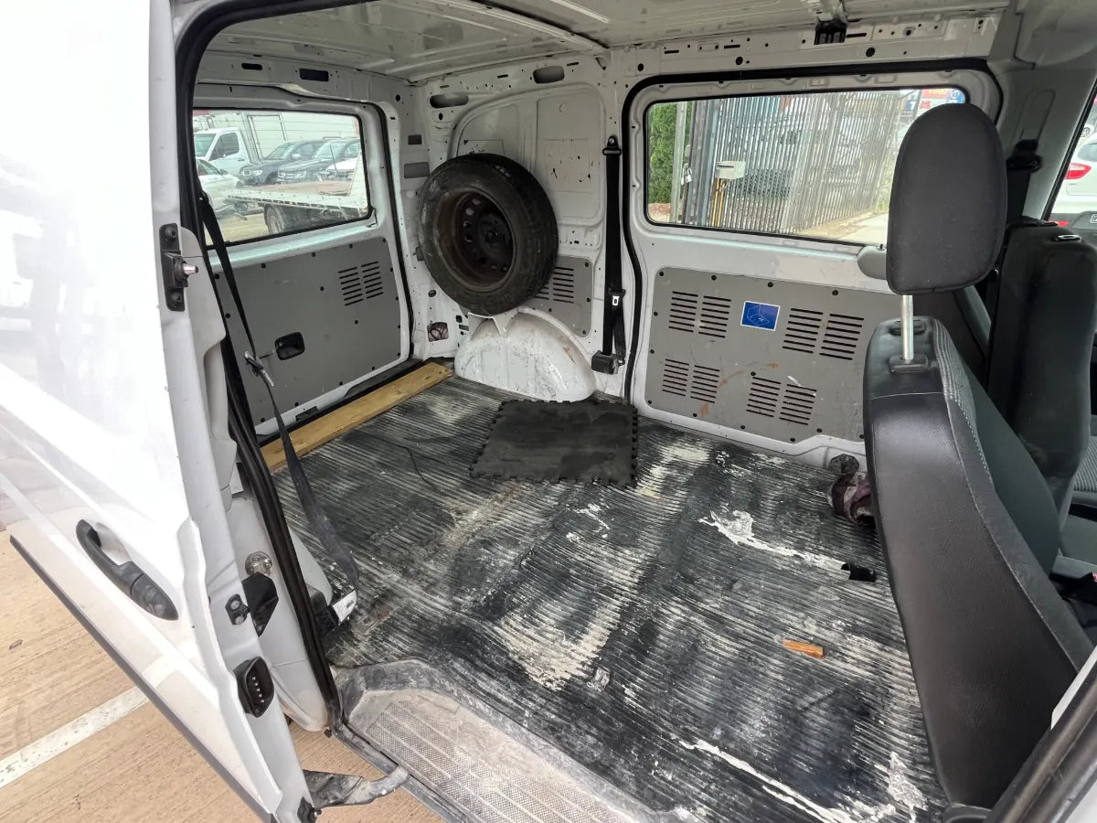 Van interior with a cargo area and removed seats