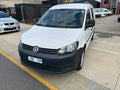 Front three-quarter view of white 2014 Volkswagen Caddy Crew Cab