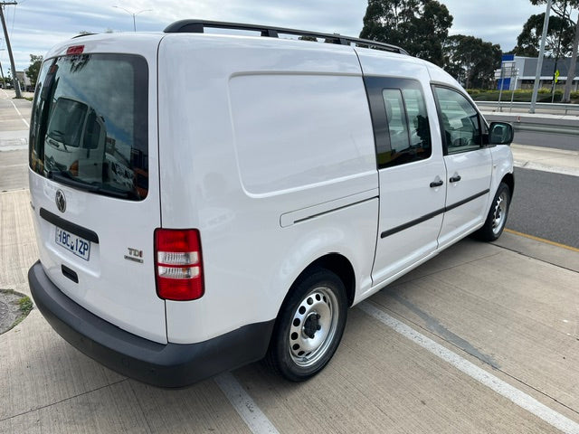 Rear side view of Volkswagen Caddy Crew Cab