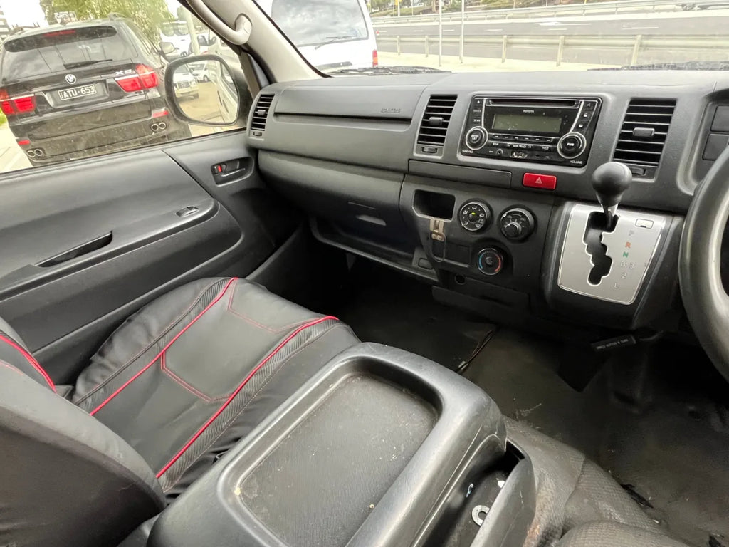 Car interior with dashboard and steering wheel visible