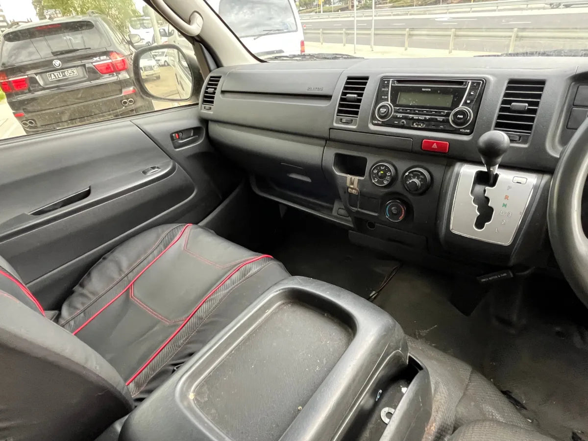 Car interior with dashboard and steering wheel visible