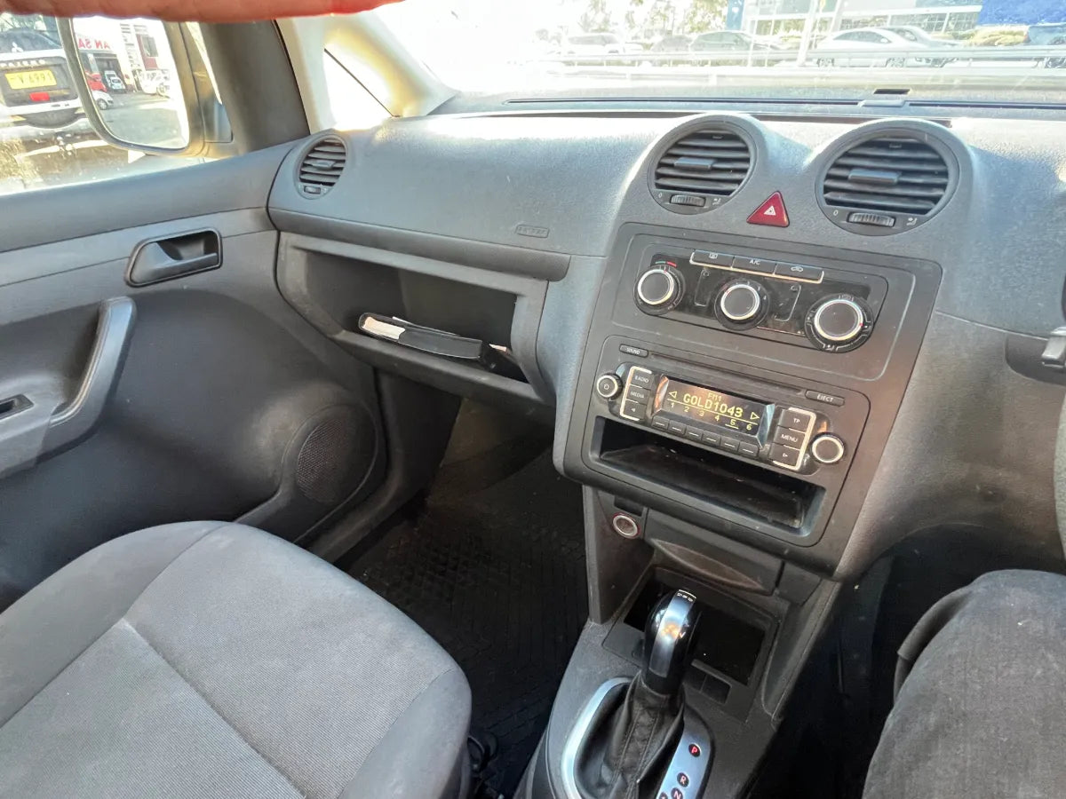 Car interior with dashboard and steering wheel visible
