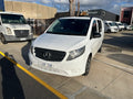 White Mercedes-Benz van parked on a street for sale at progressive vans carrum downs