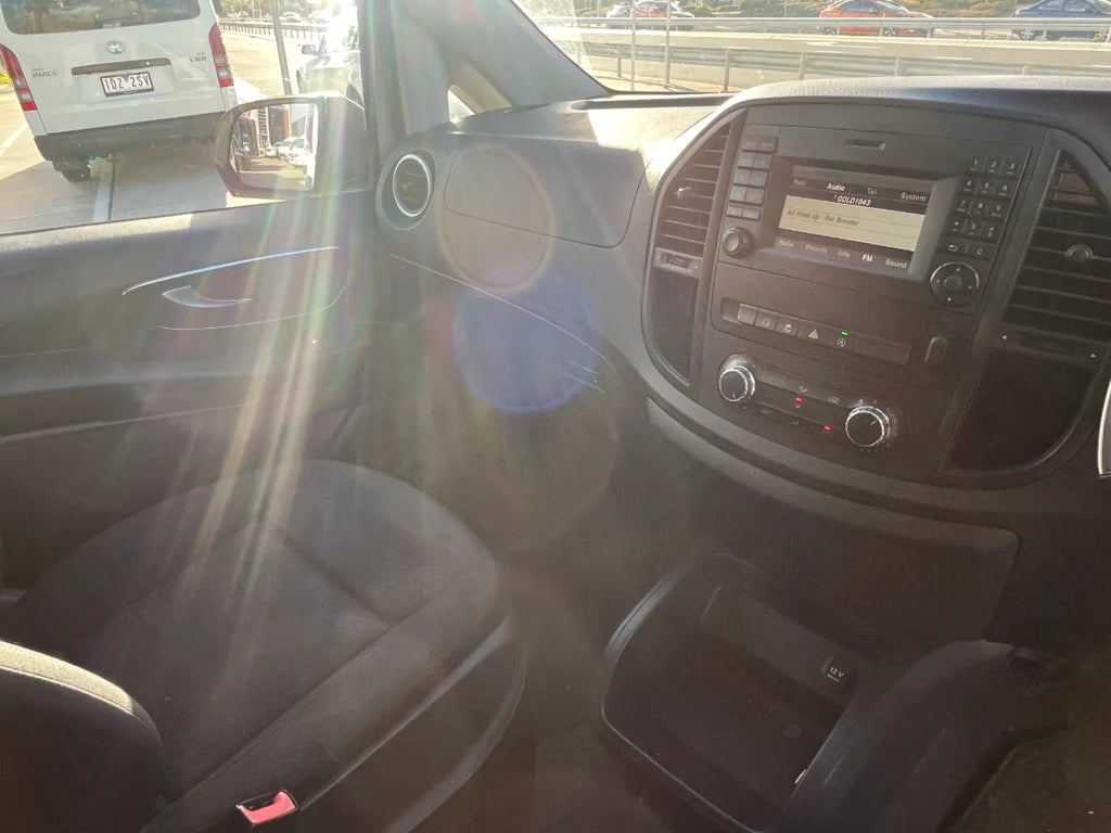 Car interior with dashboard and steering wheel visible