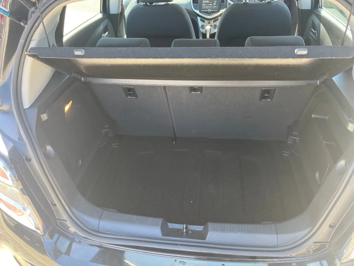 Open car trunk with black interior