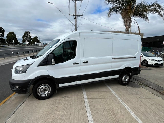 Side view of white 2021 Ford Transit long wheelbase van